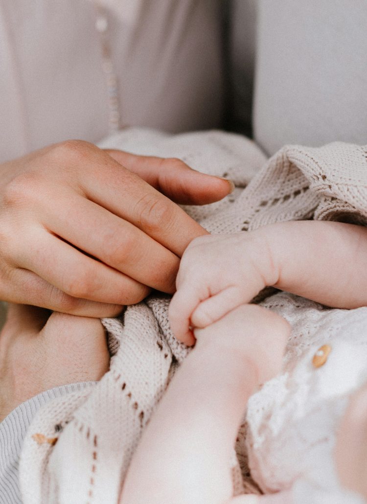 International family with newborn baby at home in Switzerland receiving postpartum support